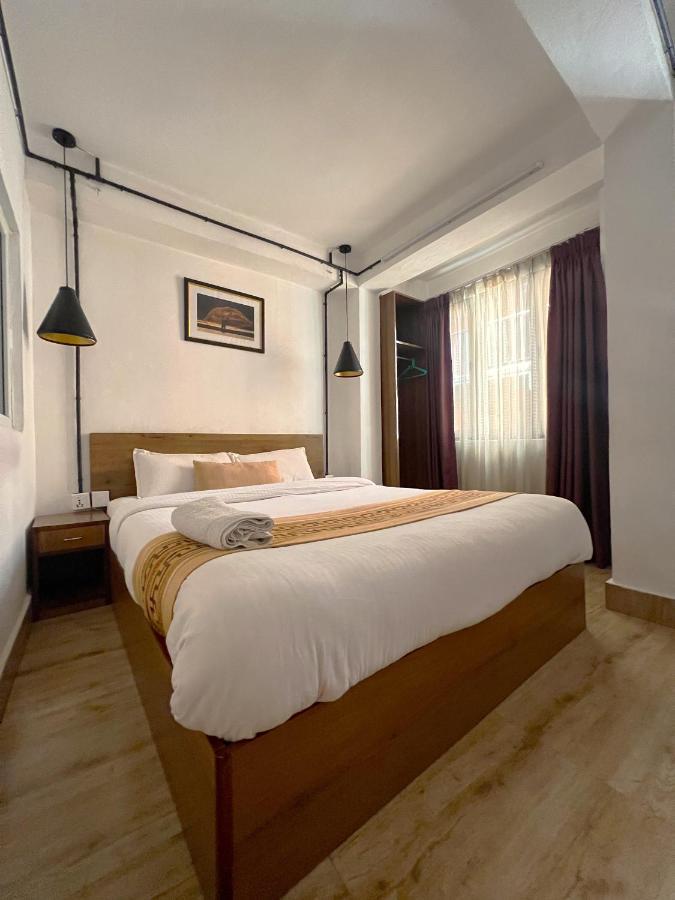 Nexus Inn- The Habitación en casa particular Katmandú